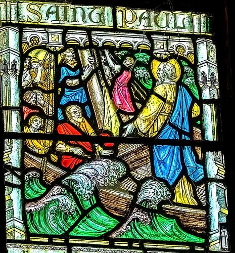 Colorful St. Paul stained glass, St. Petroc Church, Dartmouth, Devon, England. European Print